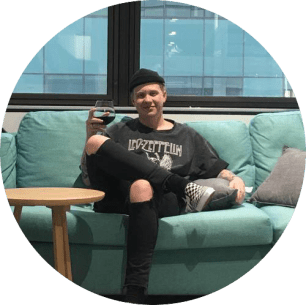 Digital marketing recruiter, Zac Hind, sitting in the Just Digital People Brisbane office.
